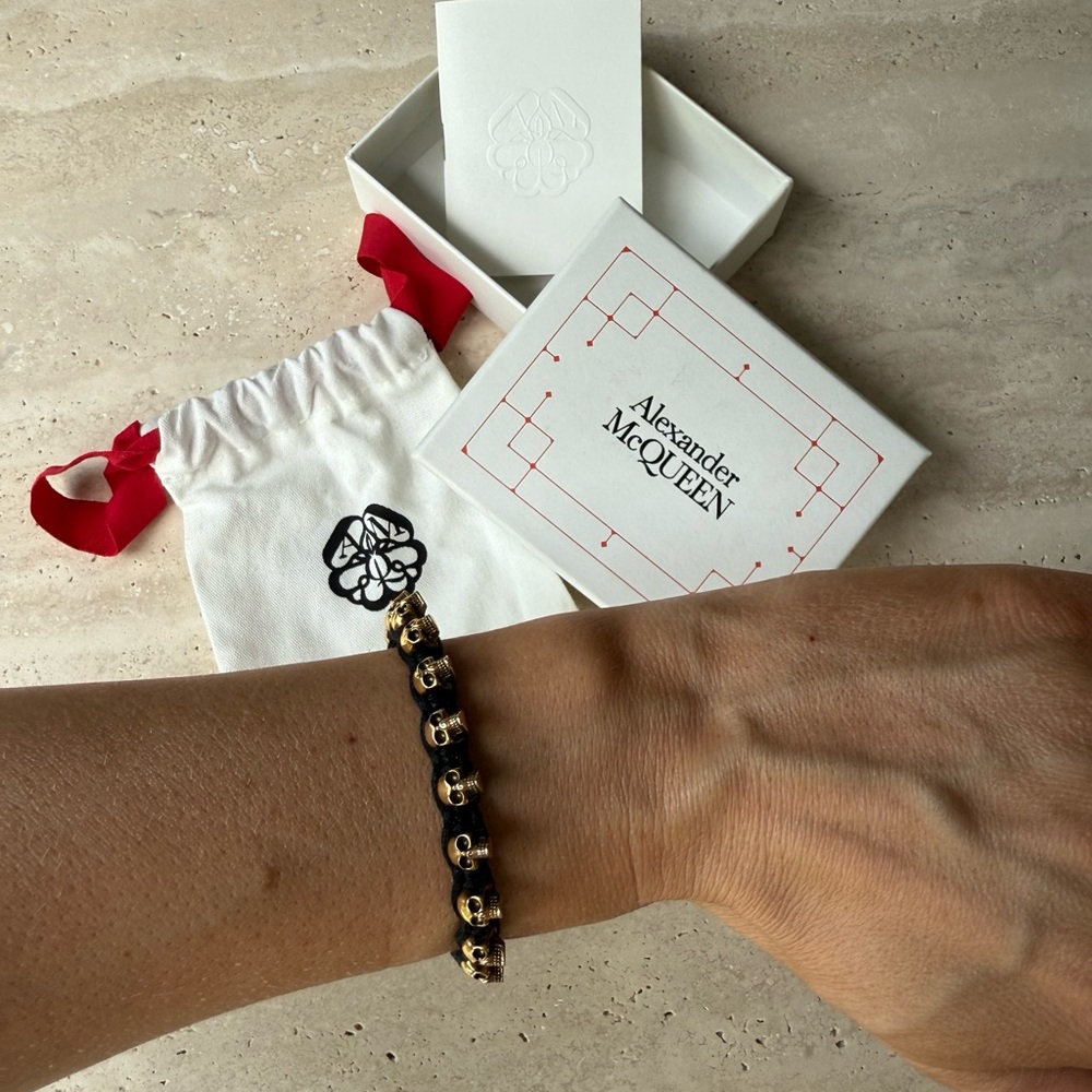 Alexander McQueen Bracelet in Black Woven and Gold Skulls adjustable EUC